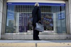 亚洲股票倾斜，在黄胶质组织后7个月高的美元