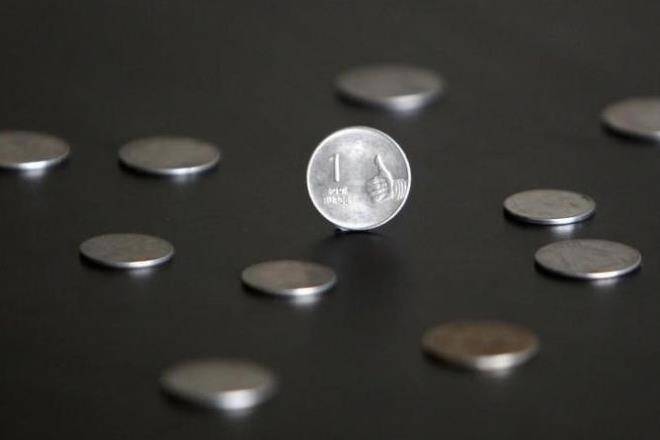 卢比将在开放的贸易方面滑倒至64.45美元