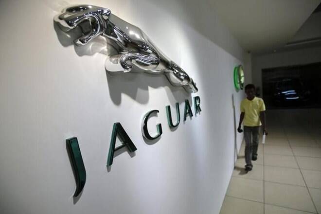 报告说，塔塔集团Moots Jaguar Land Rover Ipo，但公司否认; Tata Motors Sharesjump.